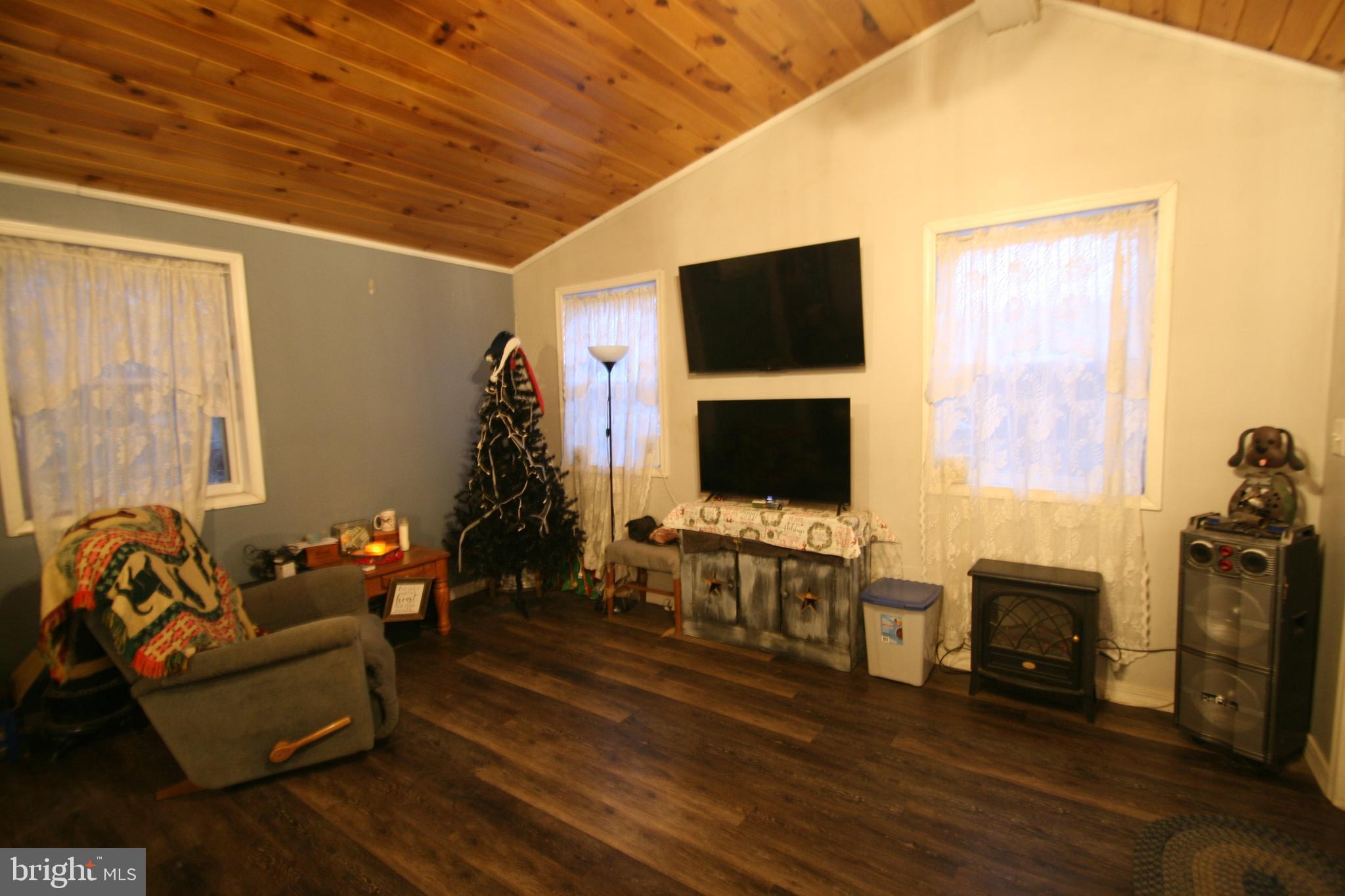 247 Valley Street Rockhill Furnace, PA 17249 - Photo 17 of 24 a living room with furniture and a flat screen tv