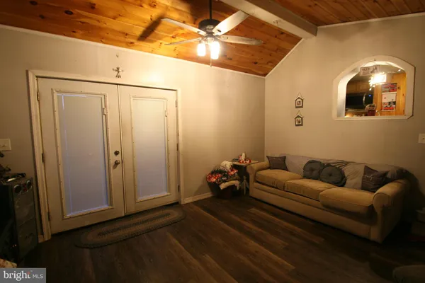 a living room with furniture and a front door