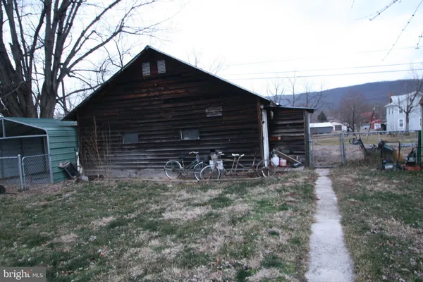 a view of house with a outdoor space