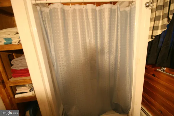 a view of a bathroom with a sink and a window