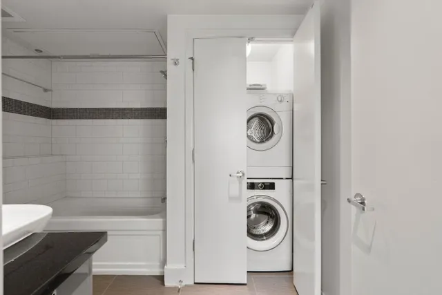 a view of washer and dryer in a utility room