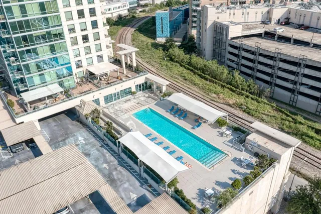 a view of a building with a yard