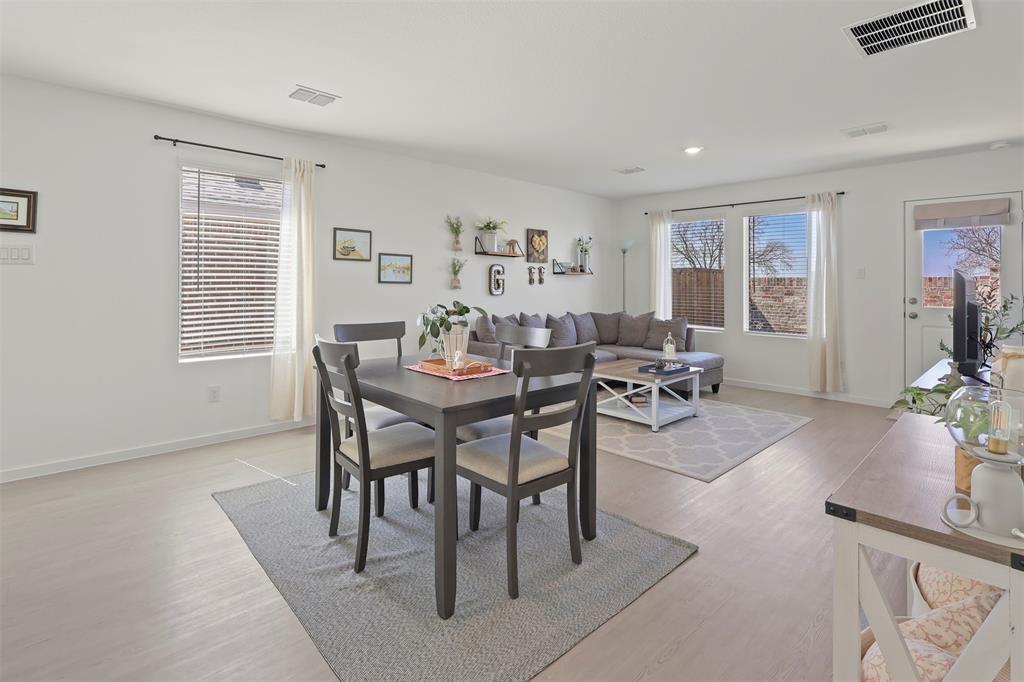 7229 Adderly Road Pilot Point, TX 76258 - Photo 11 of 34 a view of a dining room with furniture window and outside view
