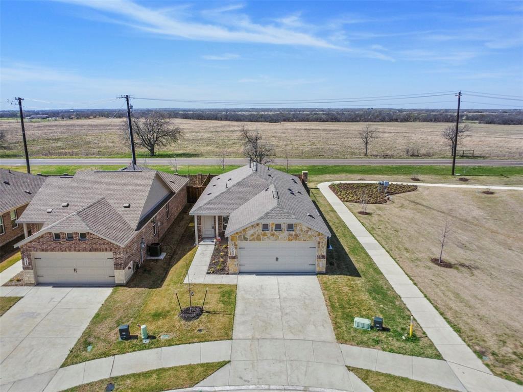 7229 Adderly Road Pilot Point, TX 76258 - Photo 31 of 34 a view of a terrace with wooden floor