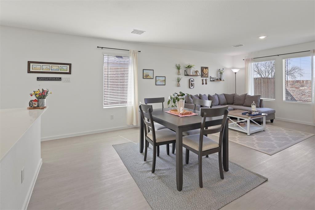7229 Adderly Road Pilot Point, TX 76258 - Photo 10 of 34 a dining room with furniture and window