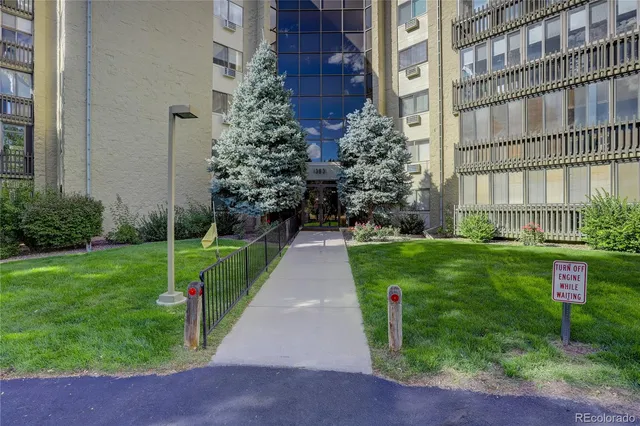 a pathway with building in front of it