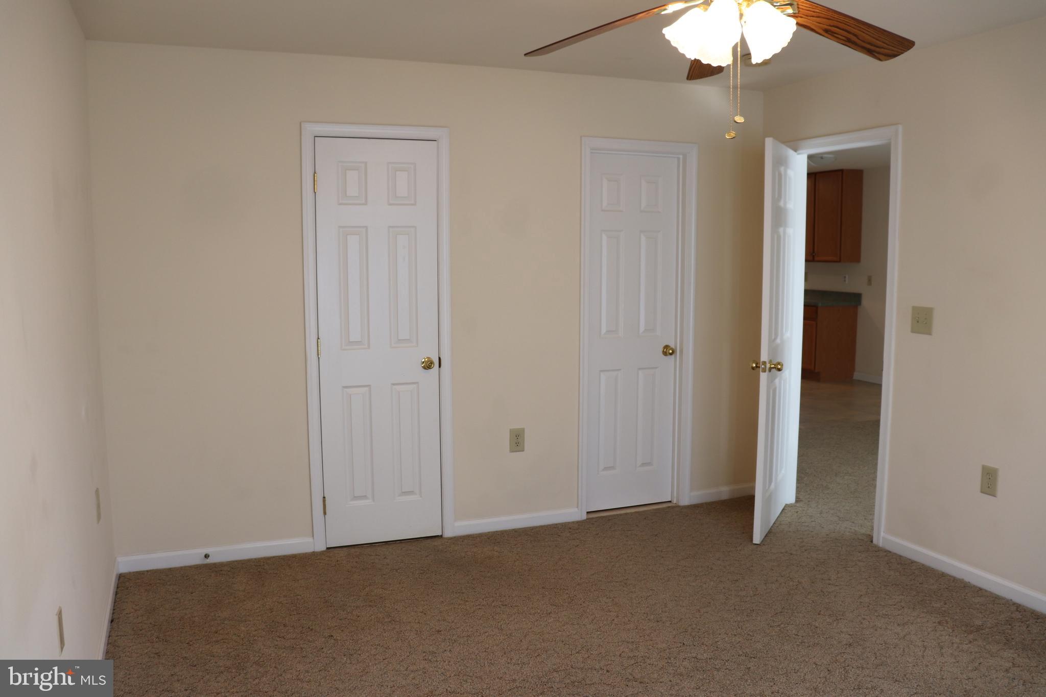 108 Fuzzy Tail Drive Ranson, WV 25438 - Photo 12 of 27 main floor primary bedroom