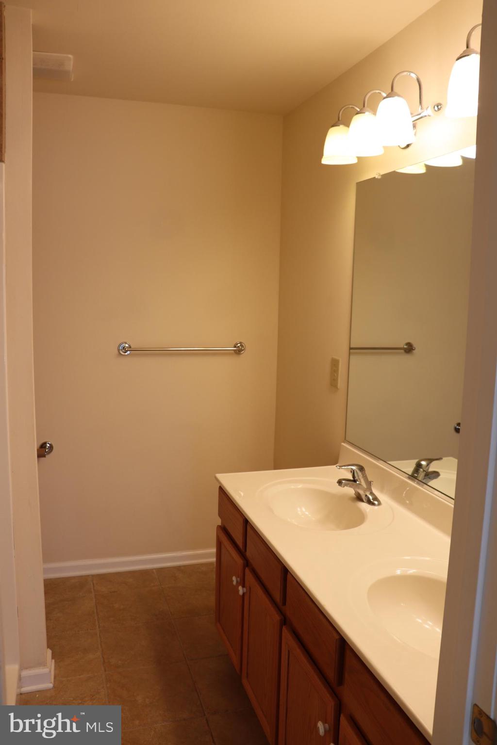 108 Fuzzy Tail Drive Ranson, WV 25438 - Photo 13 of 27 main floor full bath primary bedroom