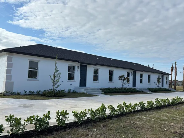 front view of house with a yard