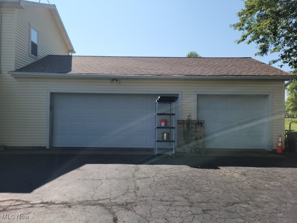 42774 Webster Road Lagrange, OH 44050 - Photo 9 of 37 Garage featuring driveway