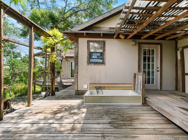 a balcony with wooden floor