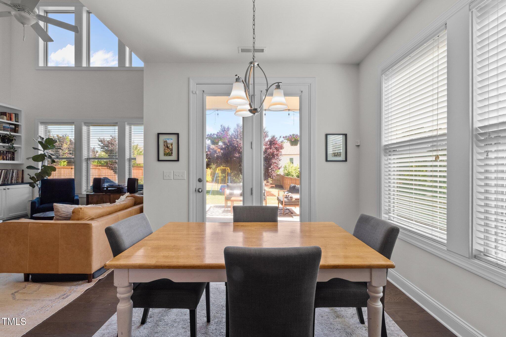 212 Crisp Road Durham, NC 27713 - Photo 11 of 36 a dining room with furniture and window