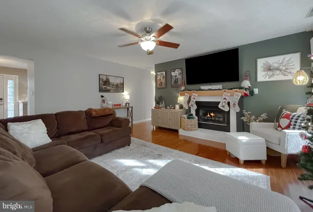 a kitchen with stainless steel appliances granite countertop a refrigerator stove and sink