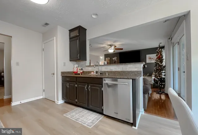 a bed room with a bed and a television