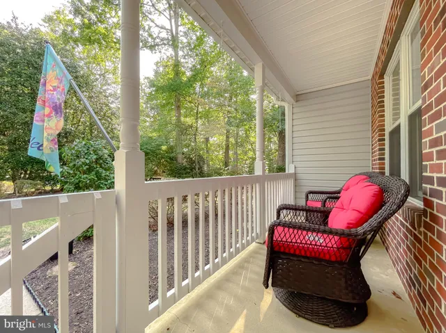 a view of a two chairs in the balcony