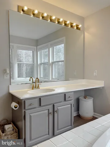 a view of a patio with a table and chairs