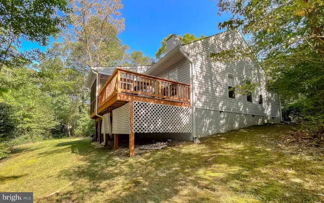 a living room with furniture and windows