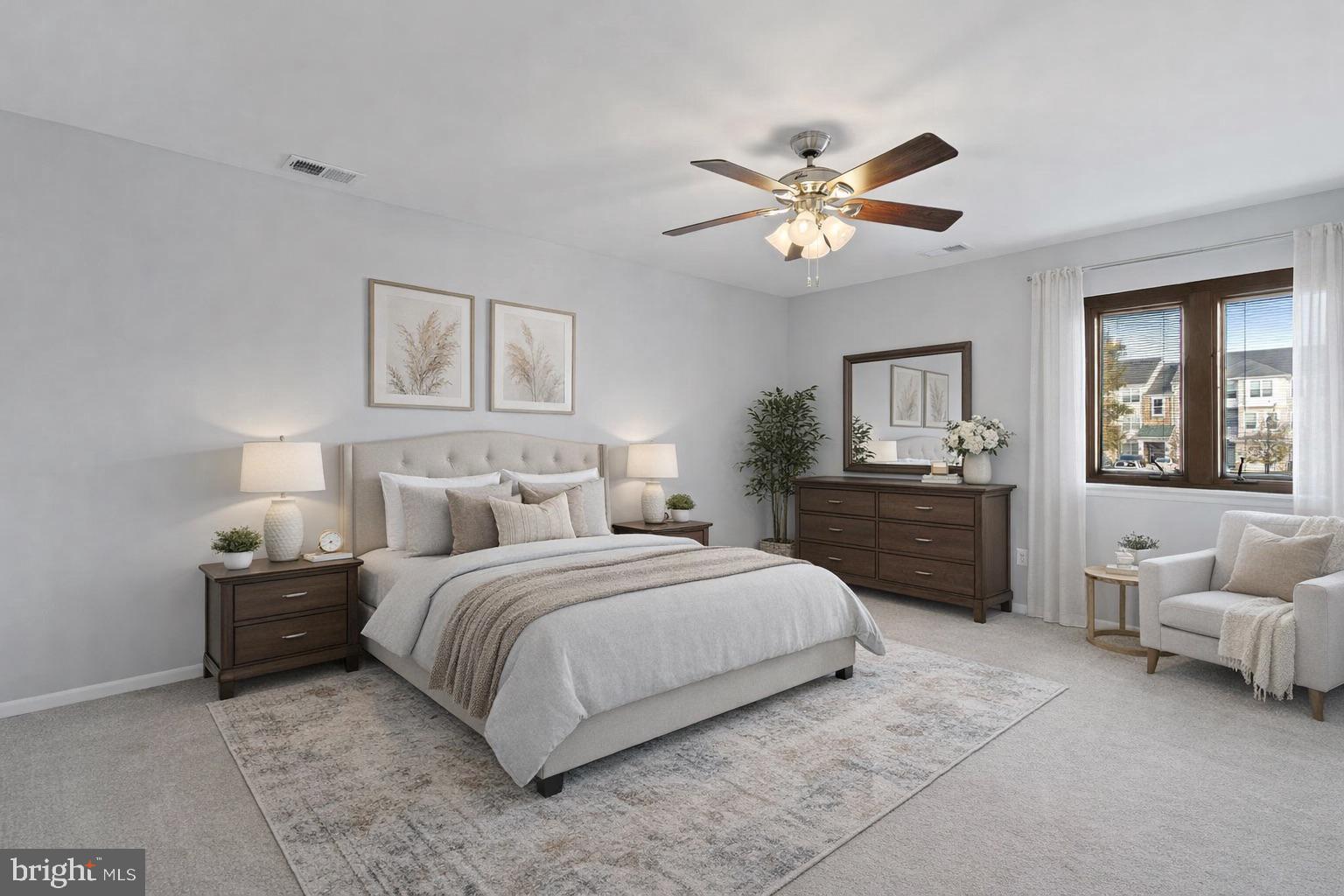 546 Riviera Drive, Unit 546B Joppa, MD 21085 - Photo 11 of 30 a bedroom with a bed and ceiling fan
