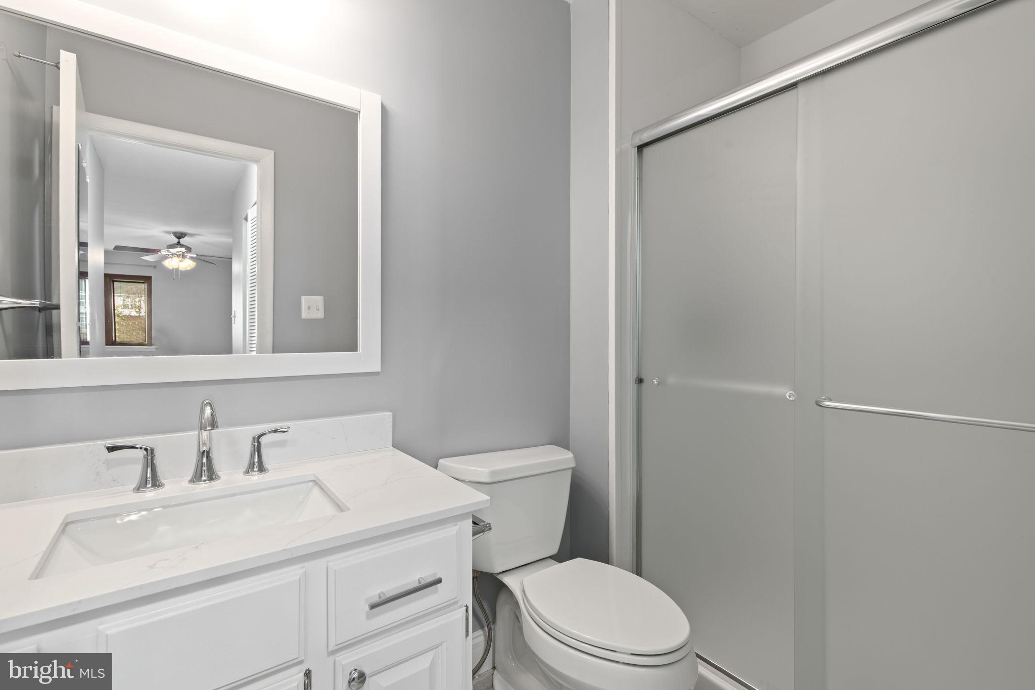 546 Riviera Drive, Unit 546B Joppa, MD 21085 - Photo 15 of 30 a bathroom with a sink toilet and vanity