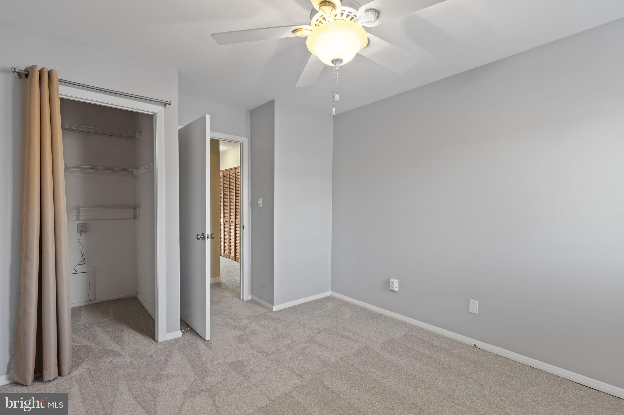 546 Riviera Drive, Unit 546B Joppa, MD 21085 - Photo 18 of 30 a view of an empty room with a window