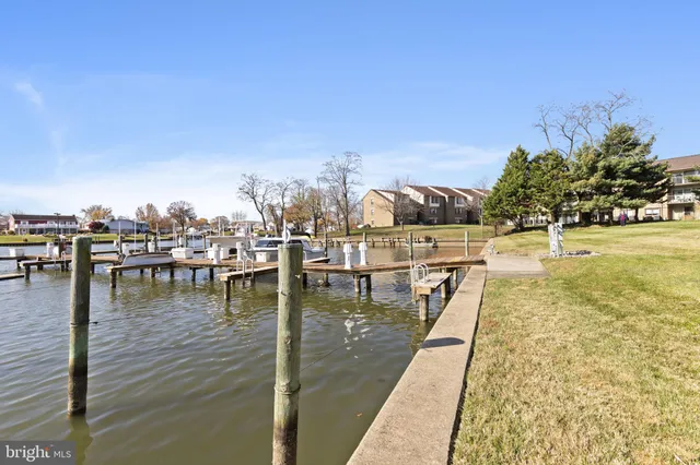 a front view of a building with parking space
