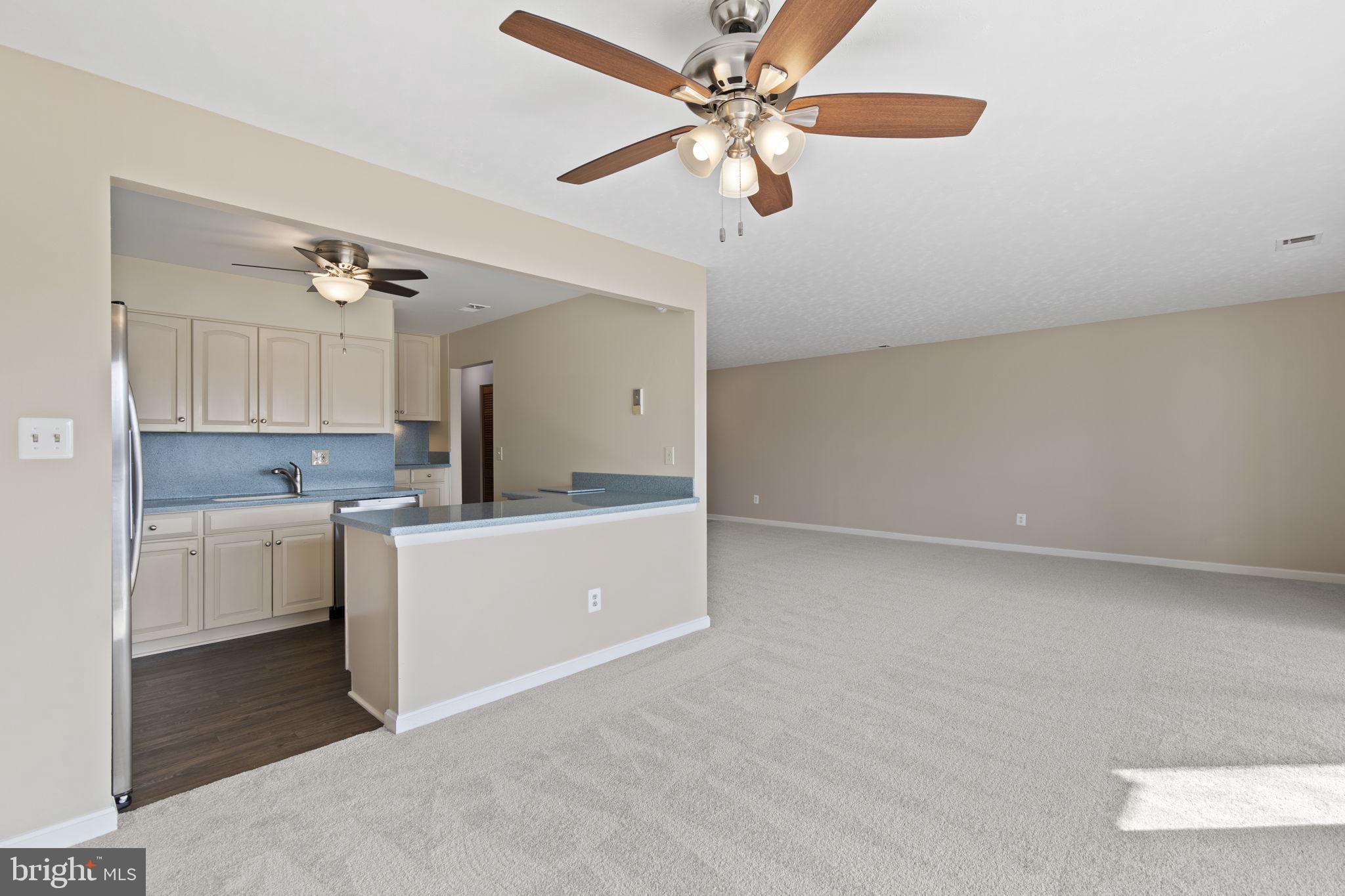 546 Riviera Drive, Unit 546B Joppa, MD 21085 - Photo 5 of 30 a view of a kitchen with a sink and dishwasher