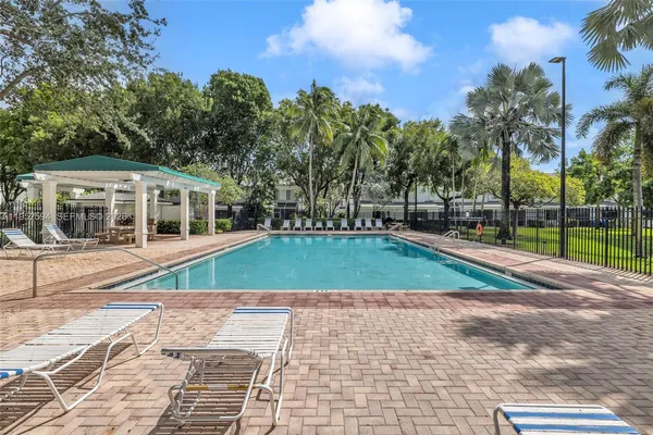 a view of a house with a swimming pool