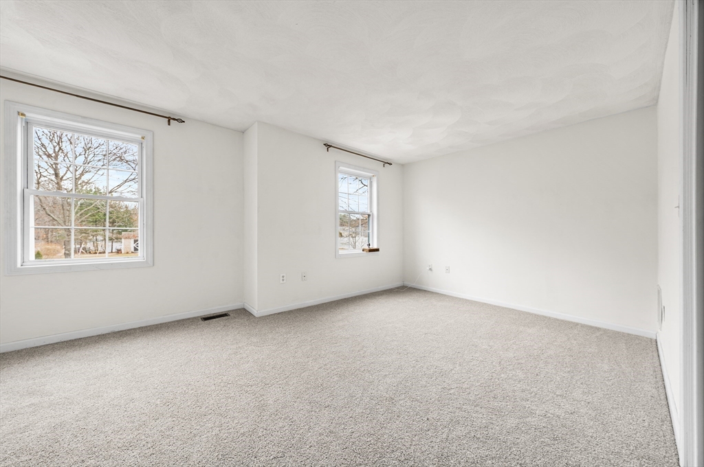 12 Horton Lane Billerica, MA 01821 - Photo 14 of 21 an empty room with windows