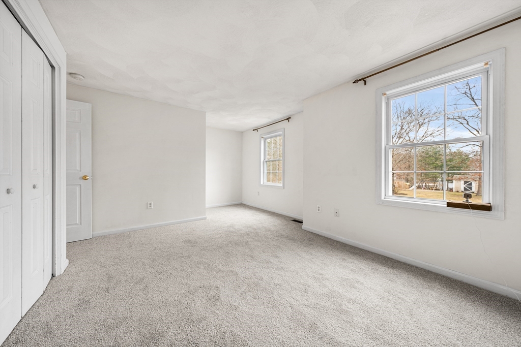 12 Horton Lane Billerica, MA 01821 - Photo 15 of 21 a view of an empty room with a window