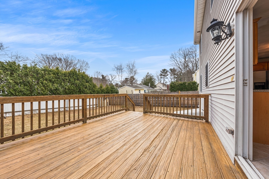 12 Horton Lane Billerica, MA 01821 - Photo 5 of 21 a view of balcony with wooden floor
