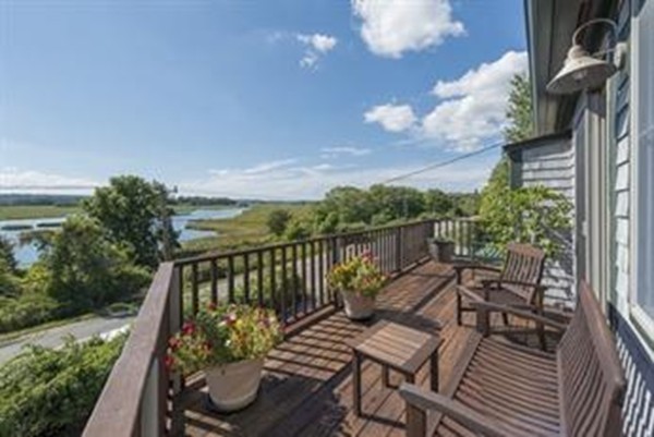 72 Little Neck Road Ipswich, MA 01938 - Photo 3 of 20 a view of a chairs and table on the balcony