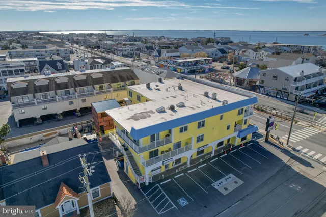 a view of a balcony with an outdoor seating