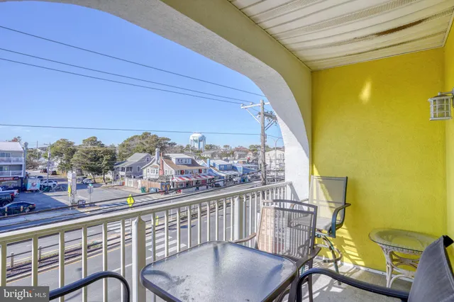 a view of a balcony with chairs