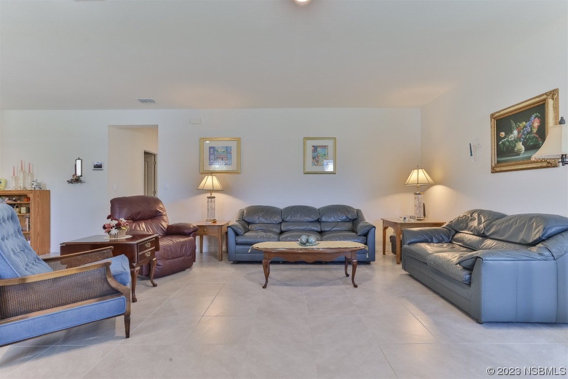 302 Sunset View Drive Edgewater, FL 32141 - Photo 11 of 45 a living room with furniture