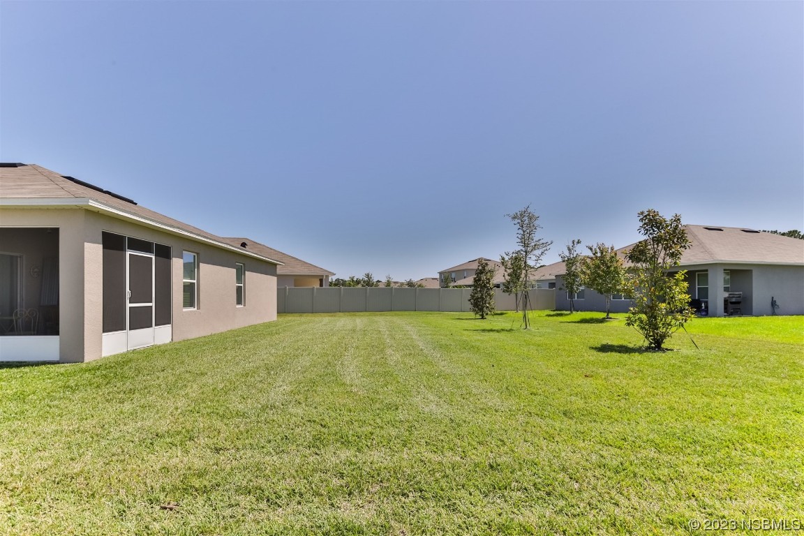 302 Sunset View Drive Edgewater, FL 32141 - Photo 32 of 45 a big room with table and chairs