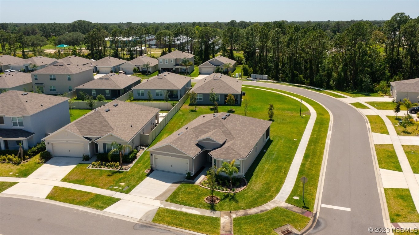 302 Sunset View Drive Edgewater, FL 32141 - Photo 37 of 45 a view of a swimming pool with a patio