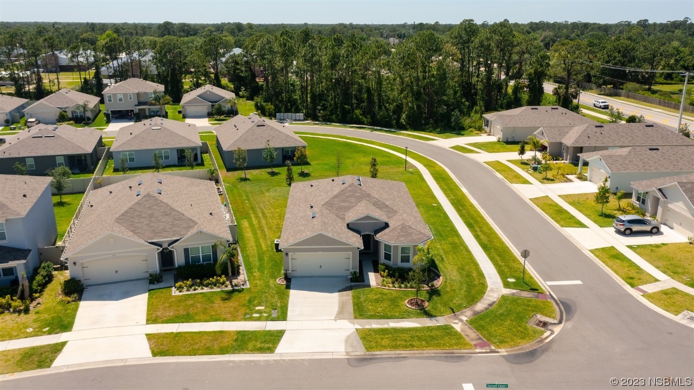 302 Sunset View Drive Edgewater, FL 32141 - Photo 38 of 45 swimming pool view with a garden and lake view