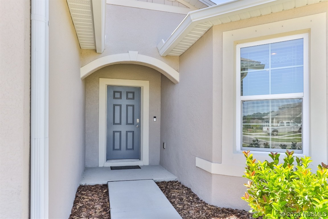 302 Sunset View Drive Edgewater, FL 32141 - Photo 6 of 45 a view of front door of a house