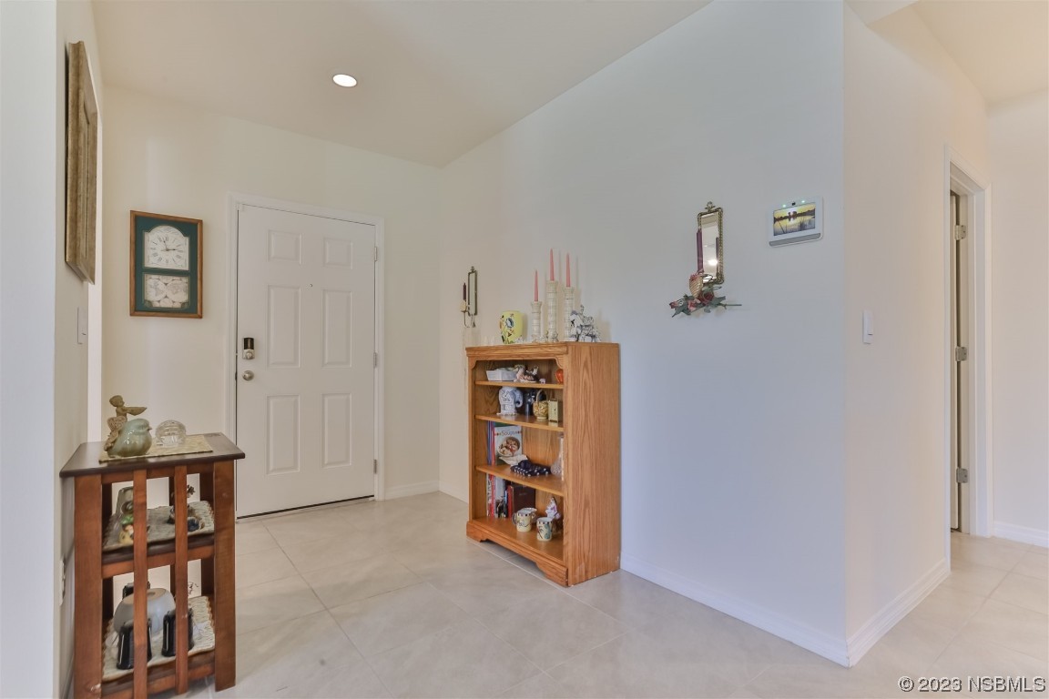 302 Sunset View Drive Edgewater, FL 32141 - Photo 7 of 45 a view of a hallway with workspace