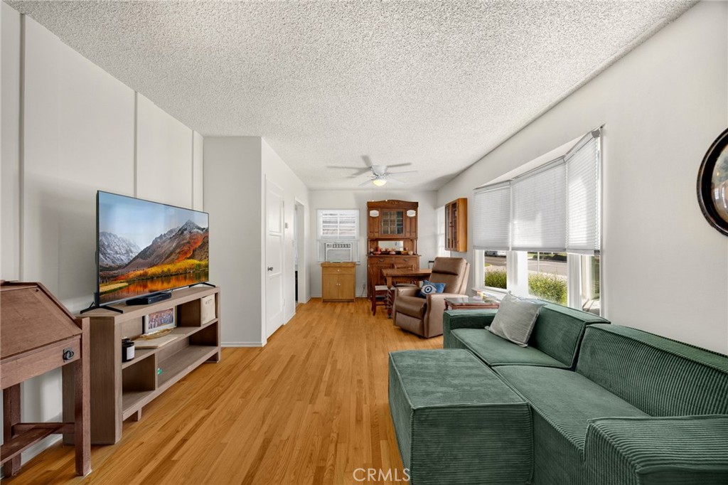 4577 Ranger Avenue El Monte, CA 91731 - Photo 15 of 25 a living room with furniture and a flat screen tv