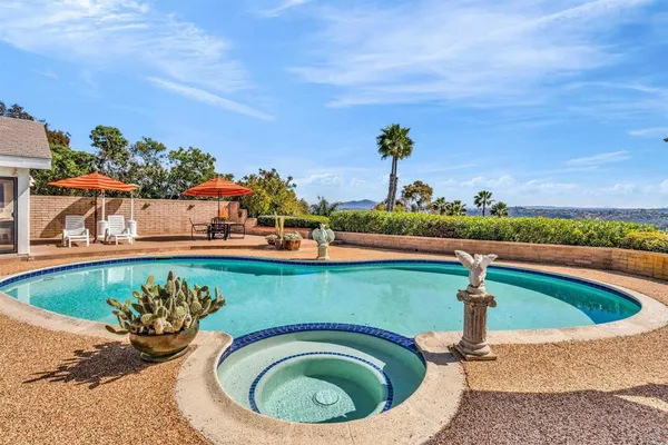 a view of a swimming pool and outdoor space