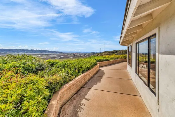 a view of a balcony with an outdoor space