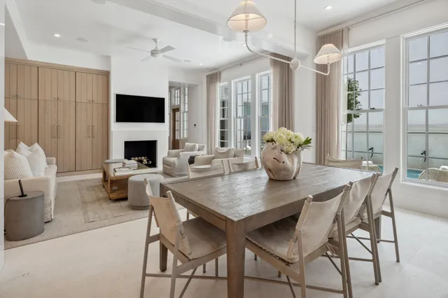 a kitchen with a table and chairs in it