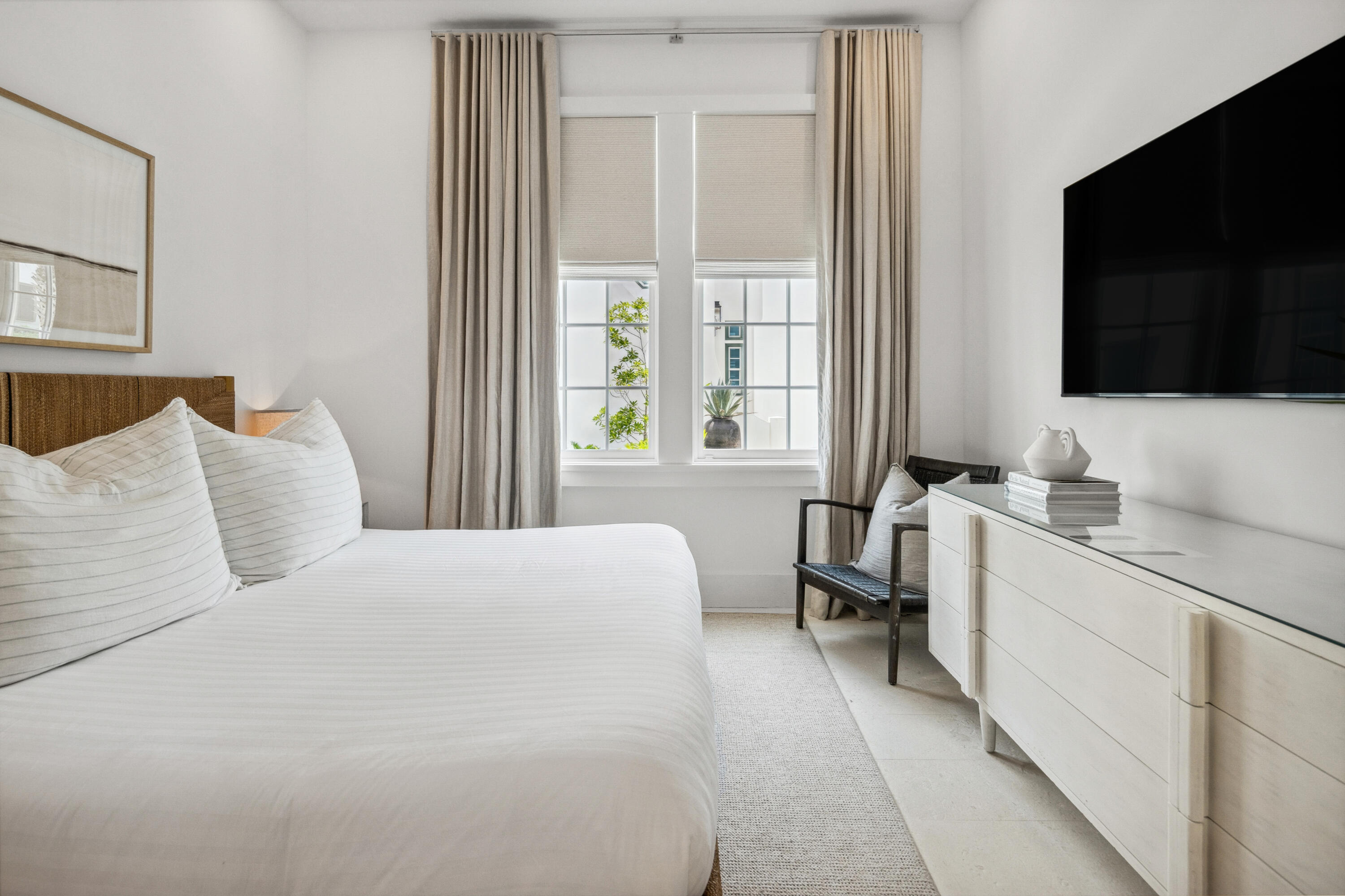 40 Silver Sea Ct Inlet Beach, Unit AA4 Inlet Beach, FL 32461 - Photo 26 of 56 a bedroom with a bed and a flat screen tv