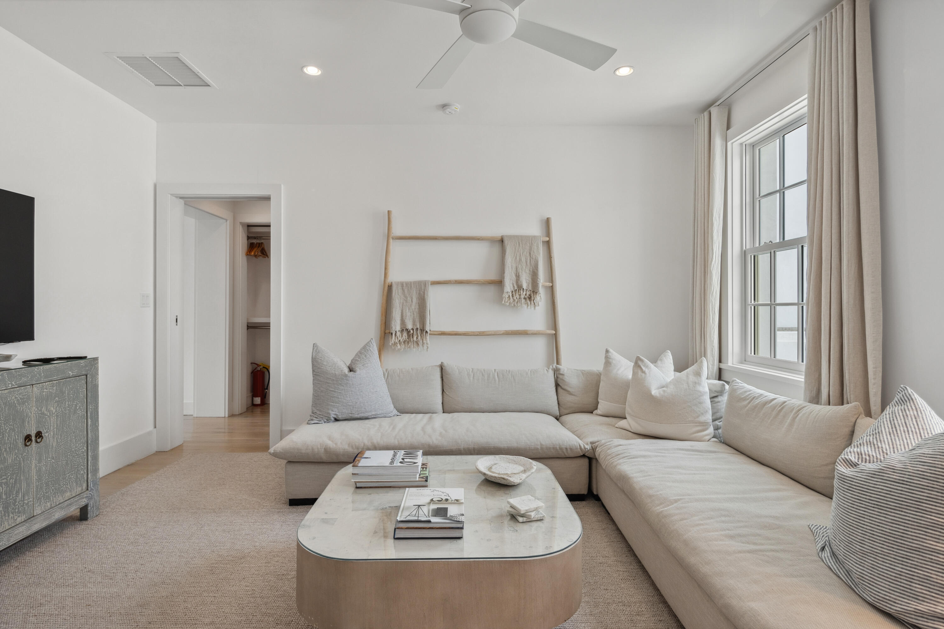 40 Silver Sea Ct Inlet Beach, Unit AA4 Inlet Beach, FL 32461 - Photo 28 of 56 a living room with furniture and a large window