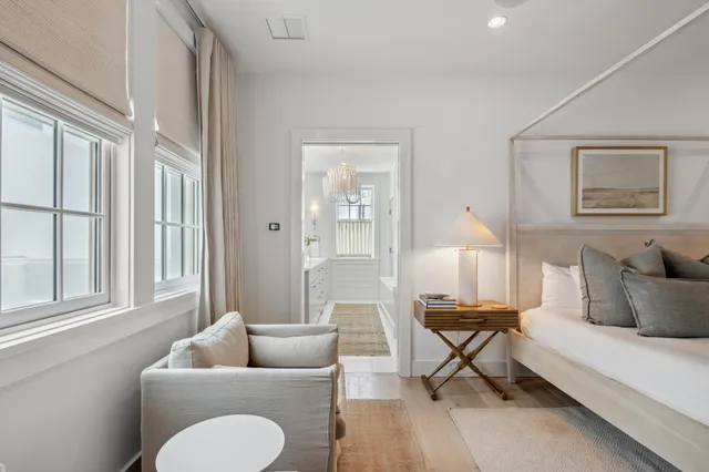a bathroom with a double vanity sink a mirror and a shower