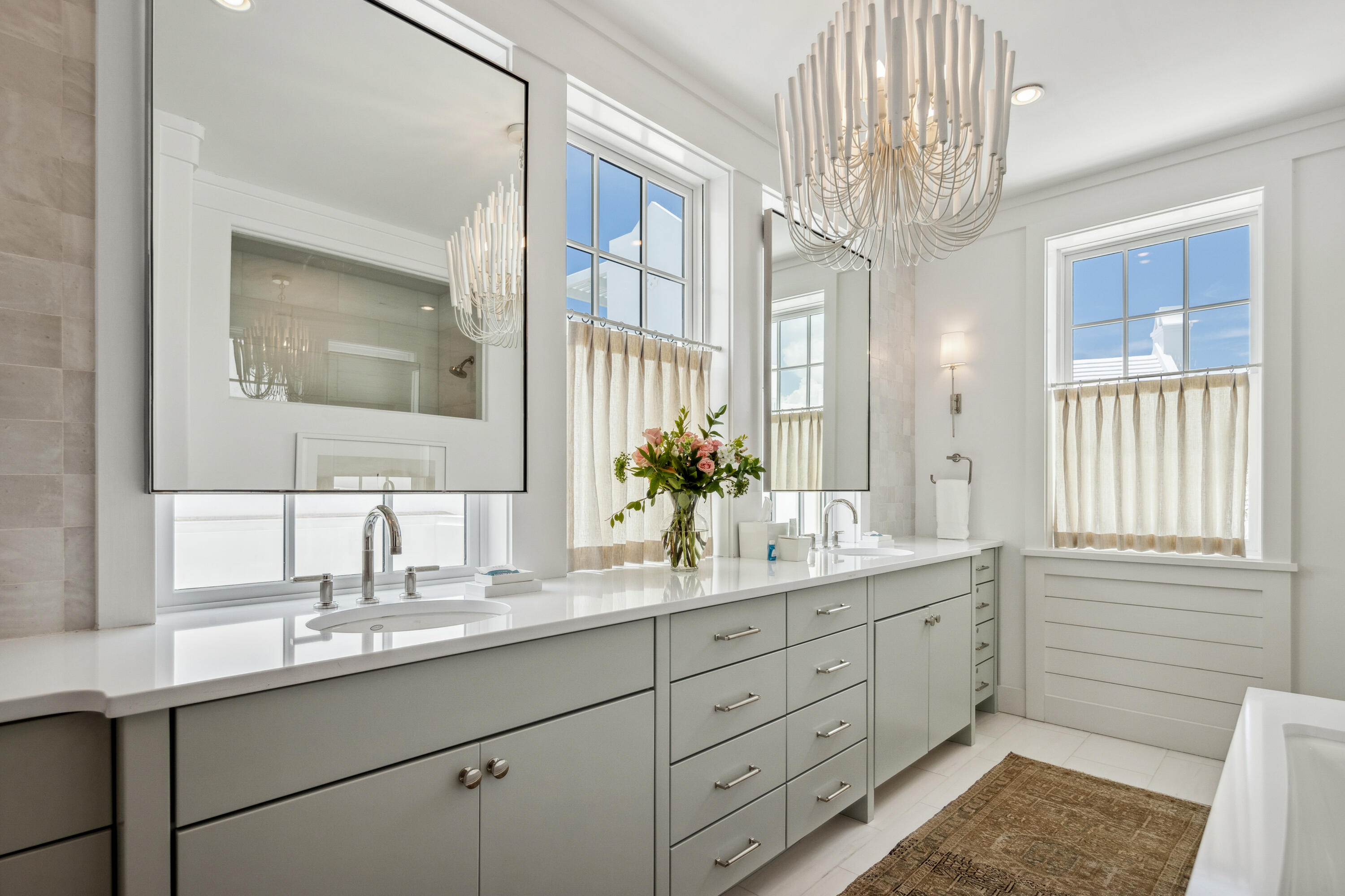 40 Silver Sea Ct Inlet Beach, Unit AA4 Inlet Beach, FL 32461 - Photo 41 of 56 a bathroom with a double vanity sink a mirror and a shower