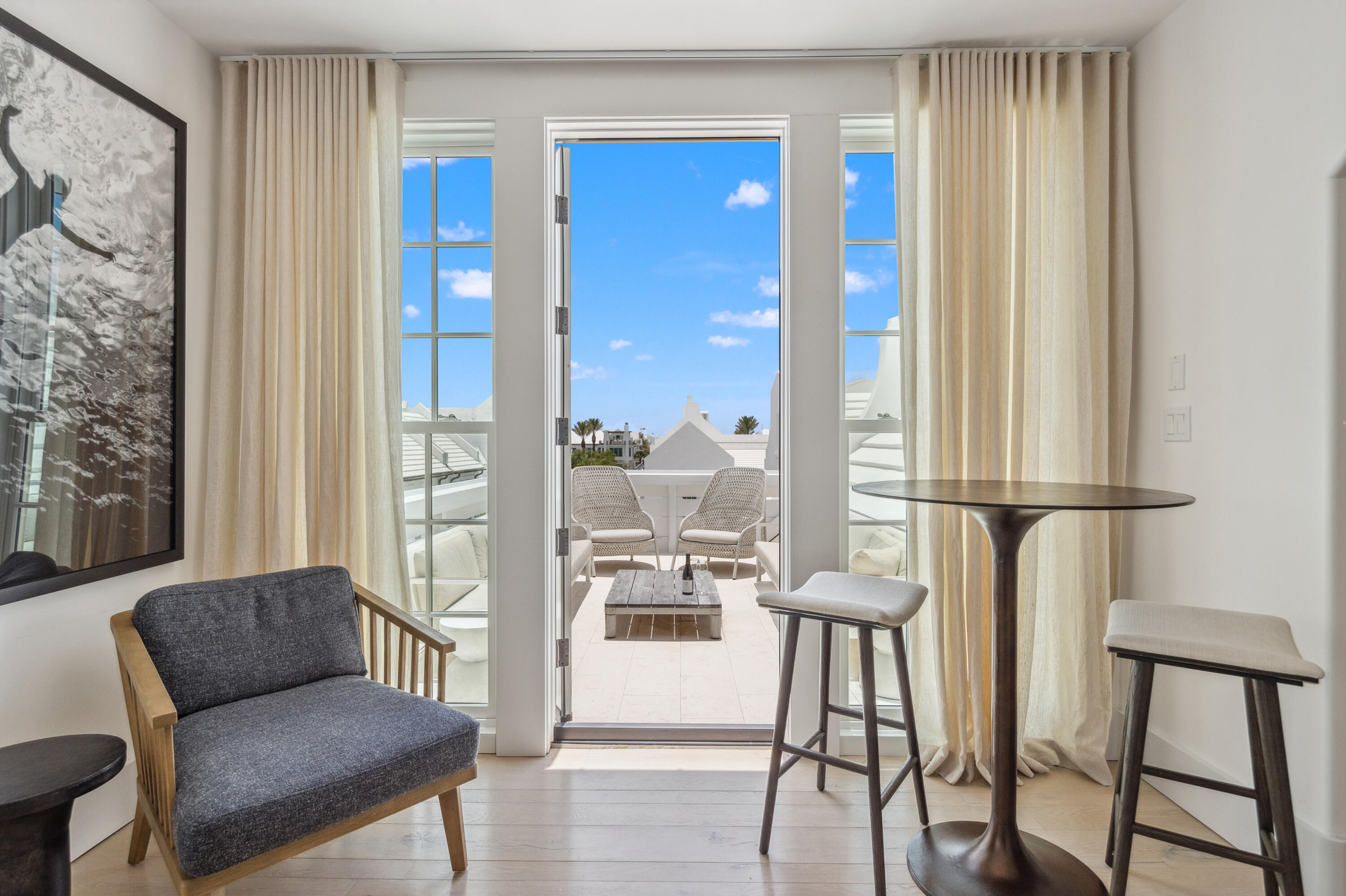 40 Silver Sea Ct Inlet Beach, Unit AA4 Inlet Beach, FL 32461 - Photo 46 of 56 a living room with furniture and a large window