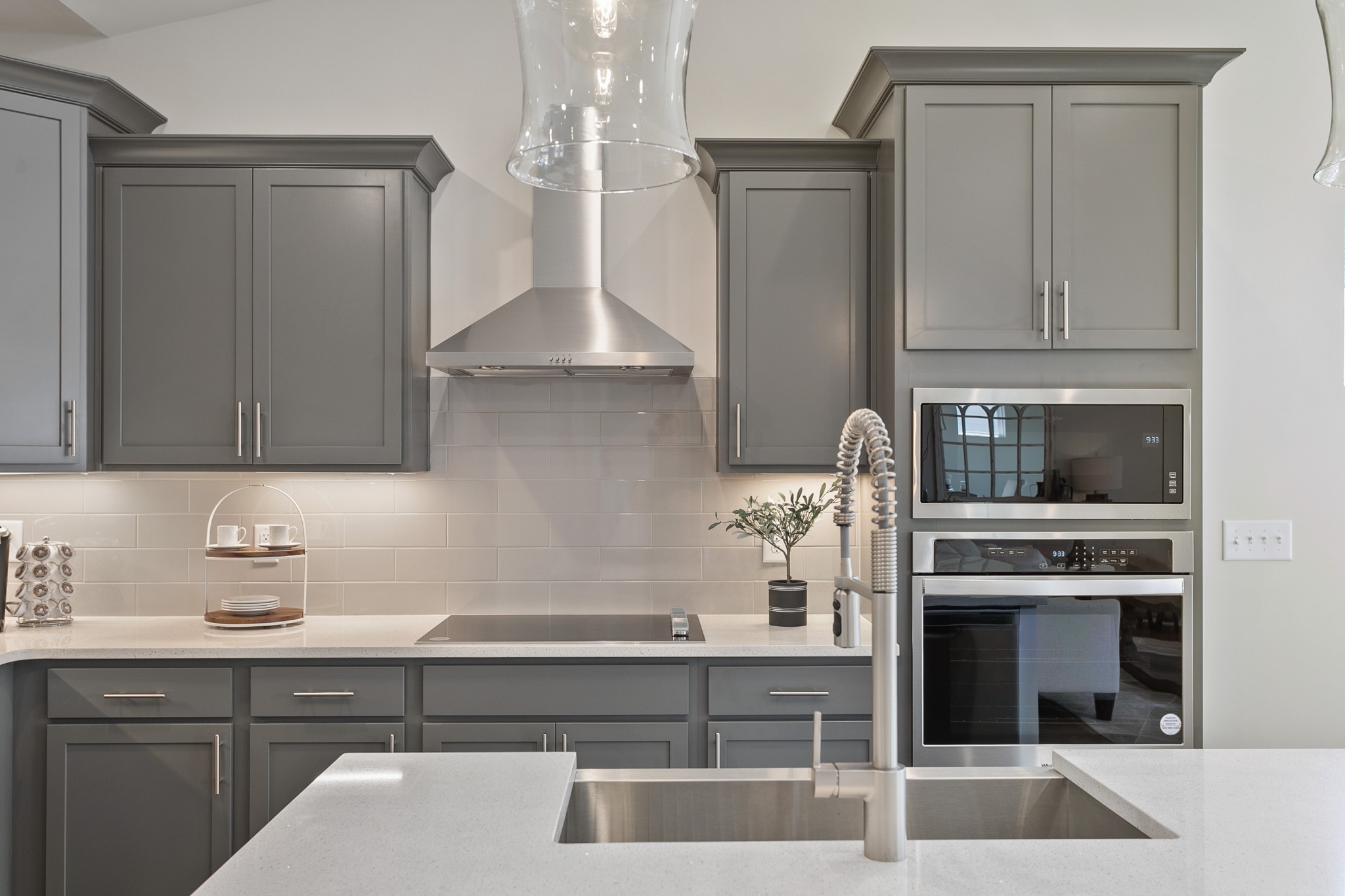 103 Riverview Run Madison, TN 37115 - Photo 13 of 54 a kitchen with a stove and a white cabinet