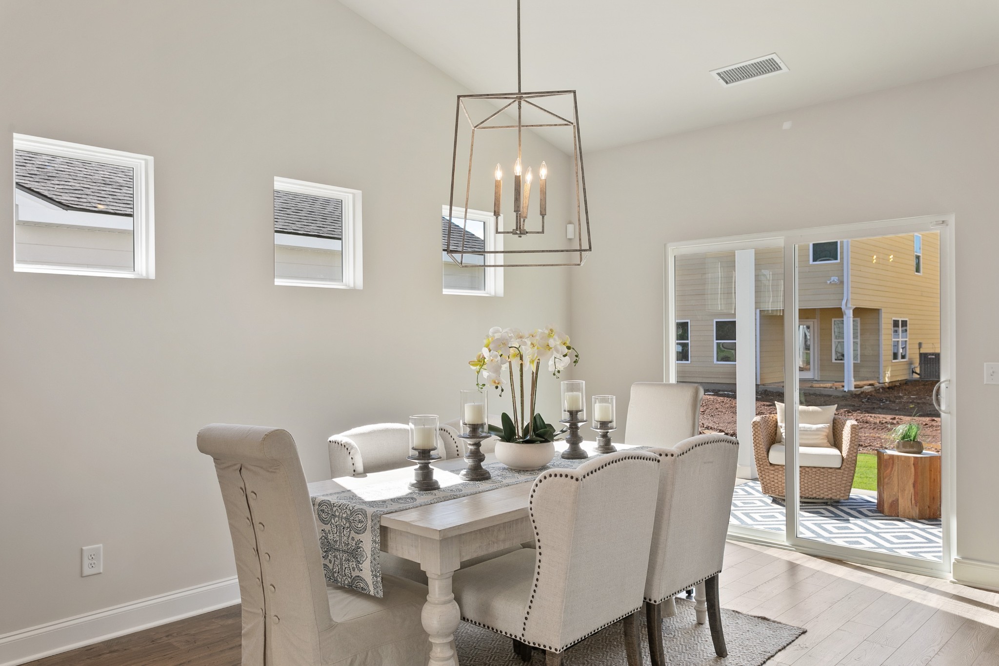 103 Riverview Run Madison, TN 37115 - Photo 21 of 54 a dining room with furniture a chandelier and wooden floor